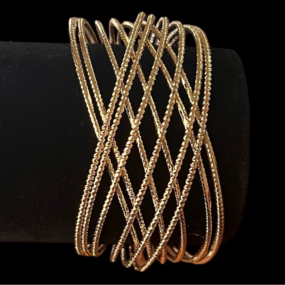 Elegant Gold Tone Bangle Bracelet